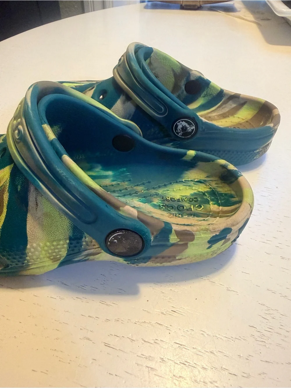 Kids Crocs Slip-On Clogs in Blue & Green swirl pattern